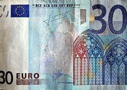 Billete falso de 30 euros / dpa/