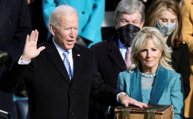 Joe Biden, accompanied by his wife Jill, during the inaugural ceremony of his term a year ago in Washington.