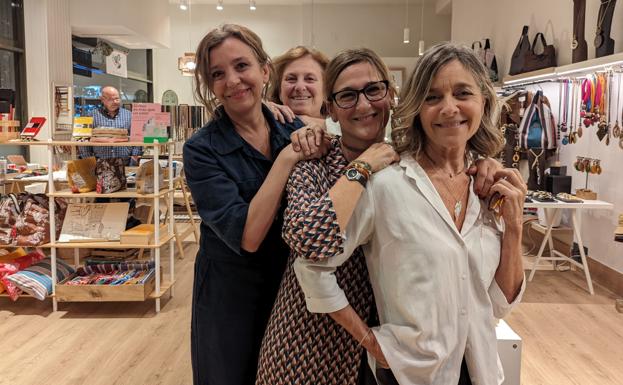 Mireia, Marian, María and Marlene pose in their new store in Bilbao, where they sell their creations.